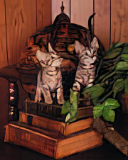 Striped Kittens on Books