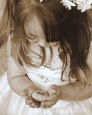 Little Girl with Pray Rock