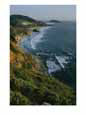 Aerial view of the steep coast descending in curves to the Pacific