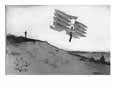 A glider rider jumps off a dune at the Chanute gliding camp on the shores of Lake Michigan