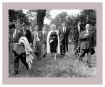 Marilyn Monroe Walking with Men in Park