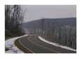 A winter view of Virginias winding, snow-lined Skyline Drive