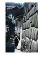People On Steep And Narrow Street With Incan Stone Wall, Cuzco, Peru