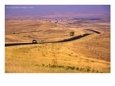 Car Driving on Highway Through Countryside, Montana, USA