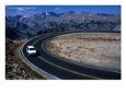 Car on Windy Road Near Beartooth Pass Beartooth Wilderness, Montana, USA