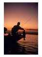 Silhouette of Bass Fisher at Sunset