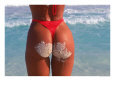 Woman in thong at beach with sandy bottom