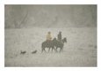 Two Cowboys Ride in Falling Snow, Accompanied by Their Dogs