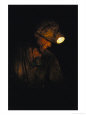 A Miner with a Head Lamp Works Inside the Csa Coal Mine at Karvina