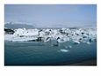 Small Boat Shares Iceberg-Filled Waters Off the Coast of Iceland