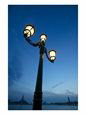 Streetlight by Edge of Water at Dusk