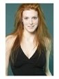 Smiling Sexy Female Young Adult Red Head Wearing Black Dress