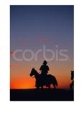 Cowboy at Sunset