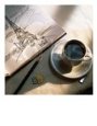 Coffee Cup and Sketch of Eiffel Tower