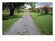 A Gravel Road Marks the Entrance/Exit to Waveland Farm in Nebraska