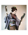 Young Geisha Fixing Hair