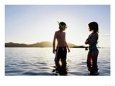 Children Standing in Water at Sunset, Playa Panama, Costa Rica
