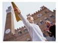 Boy Throwing Paper Aeroplane, Siena, Italy