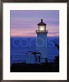 Lit-Up Lighthouse at Twilight
