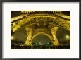 Line of Tourists Queuing Under Eiffel Tower at Night, Paris, France