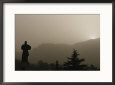 Silhouetted Statue of Damo at the Entrance to Shaolin