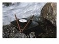 Sushi and Chopsticks Beside Rushing Water