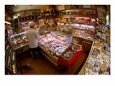 Customer in Cheese Shop, Paris, France