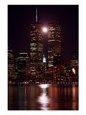 A Full Moon Rises Between New York