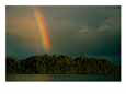 A Rainbow Rises over an Island