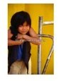 Portrait of Lao Girl at Entrance to Wat St. Muang, Vientiane, Vientiane Prefecture, Laos