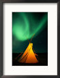 A Solitary Tepee is Illuminated by the Aurora Borealis