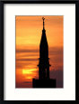 The Sun Sets for the Last Time Before Ramadan Behind the Cresent Moon of a Mosque